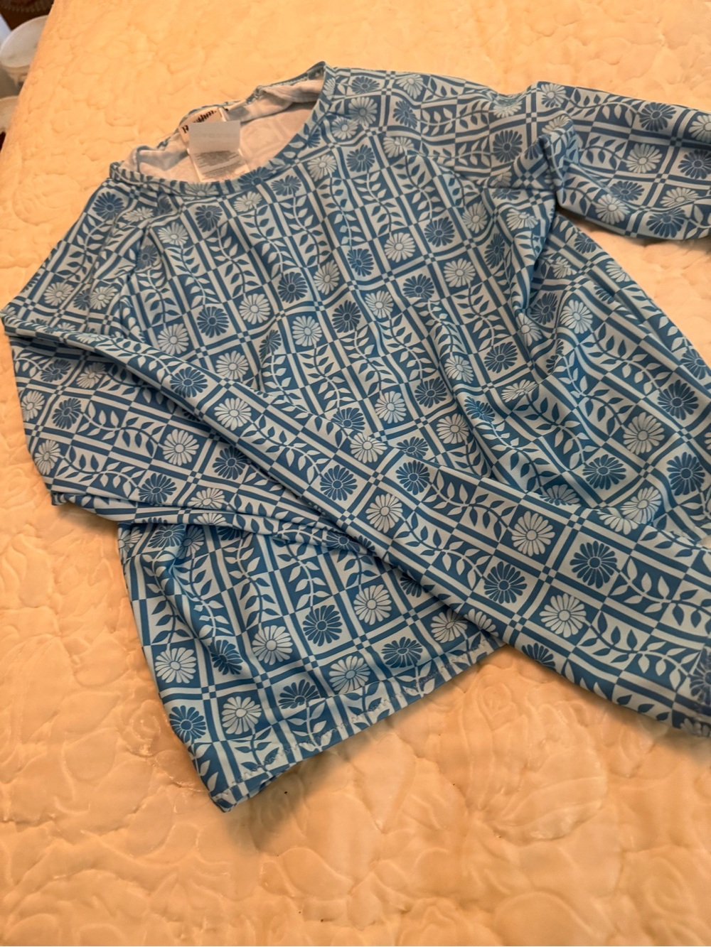 Blue Floral Geometric Long Sleeve rash guard top and 2 tone blue bottoms